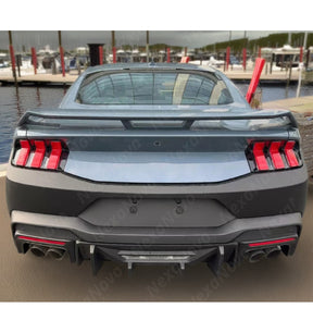 Competition style matte black rear primed bumper for Ford Mustang EcoBoost Coupe 2-Door 2024, 2025 by NexaNovo.
