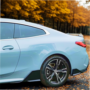 Gloss black Nexanovo VTEN side skirts enhancing a BMW 4 Series

