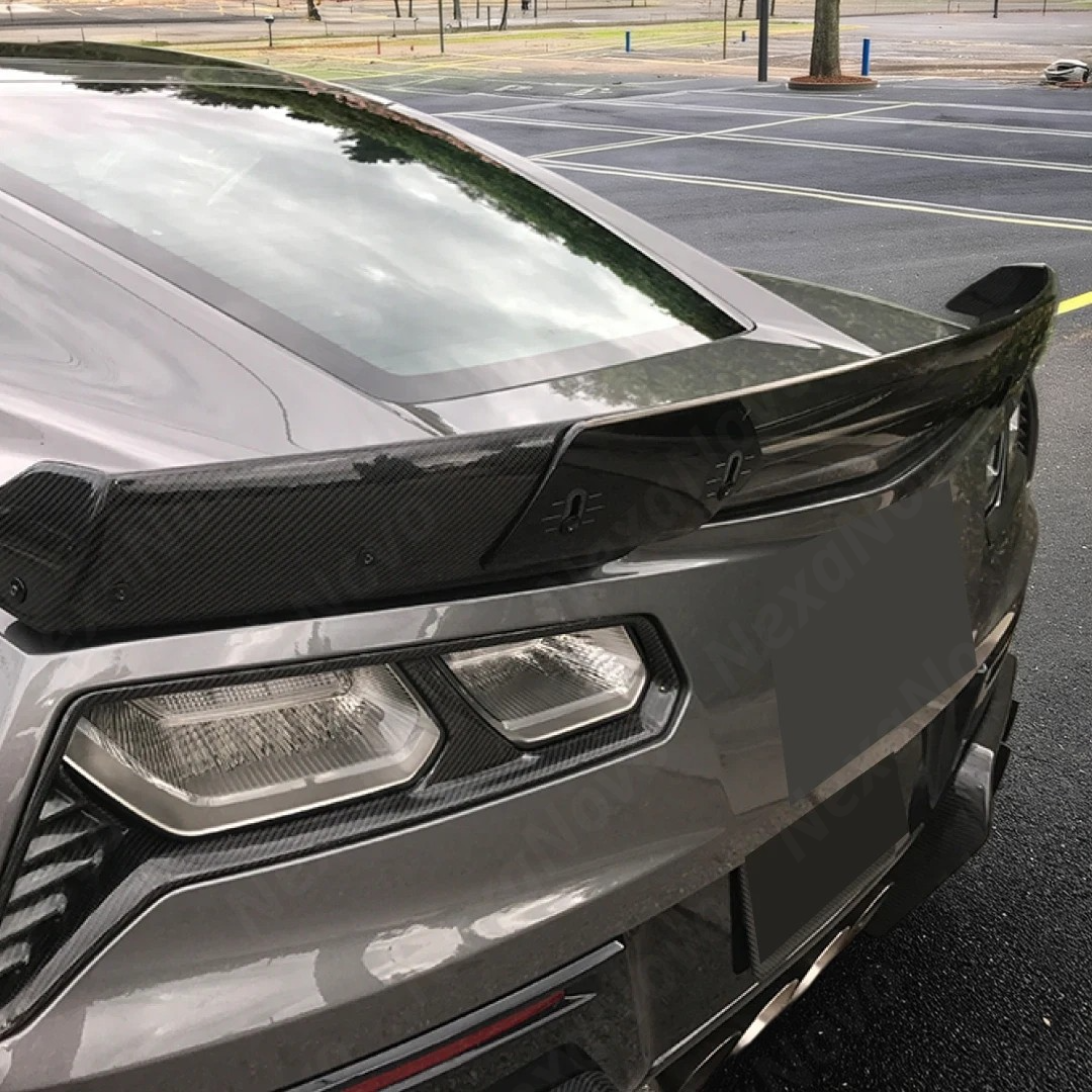 The lightweight look of a carbon fiber print spoiler on a C7

