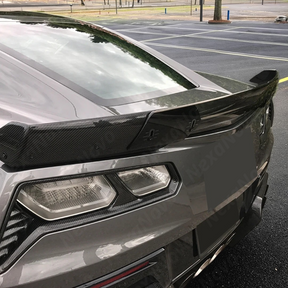 The lightweight look of a carbon fiber print spoiler on a C7

