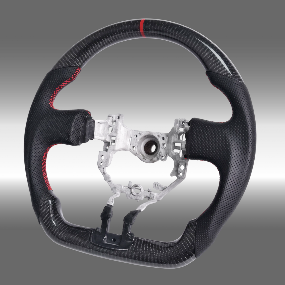 Custom 3K gloss carbon fiber sport steering wheel with red top stripe installed in a Scion FR-S / Subaru BRZ cabin