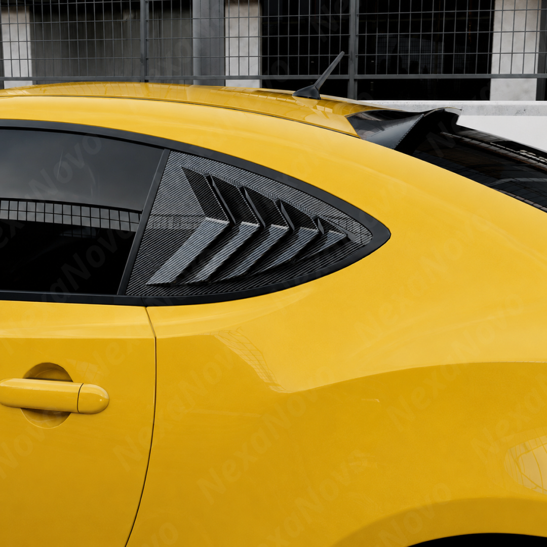 Side perspective highlighting the aerodynamic profile of the carbon print rear quarter trim