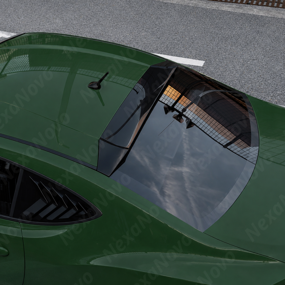 Top-down view highlighting the sleek aerodynamic curvature of the gloss black roof visor