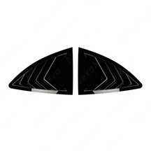 Close-up of the aggressive triple-slat design on the 86/BRZ gloss black window louvers