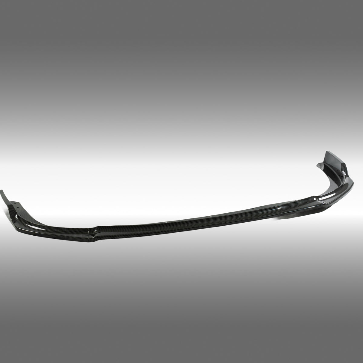 Close-up of the high-definition carbon fiber print weave on the NexaNovo Subaru STI front lip