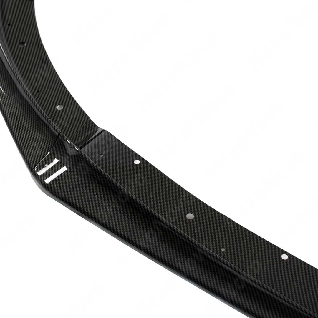 Centered product-only shot of the NexaNovo STI carbon fiber print front bumper splitter