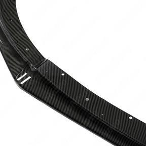 Centered product-only shot of the NexaNovo STI carbon fiber print front bumper splitter