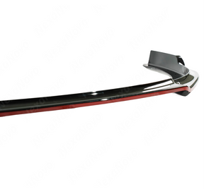 Standalone view of the uninstalled NexaNovo gloss black front bumper splitter with red pinstripe