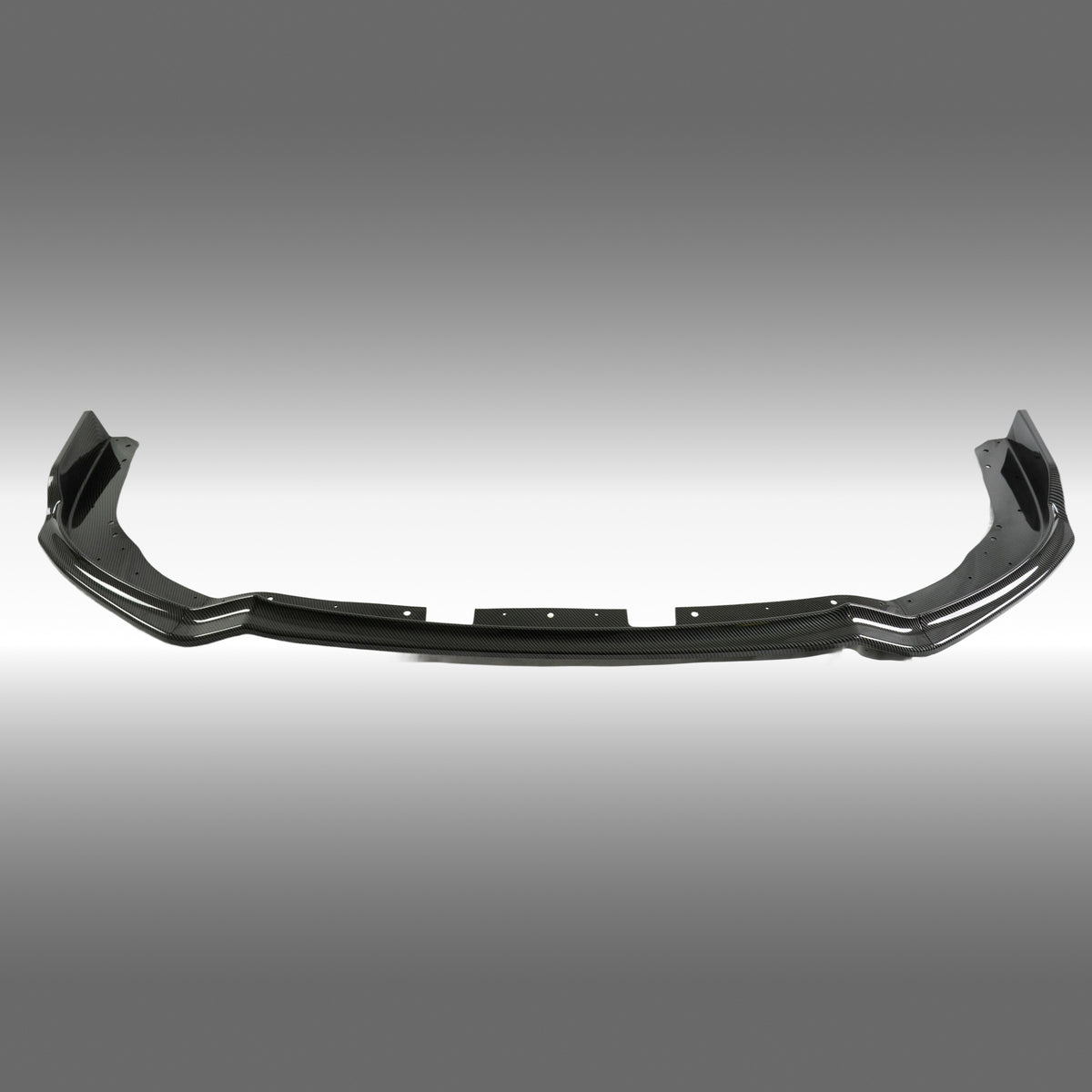 Carbon fiber print front splitter lip installed on a 2011 Subaru Impreza WRX STI