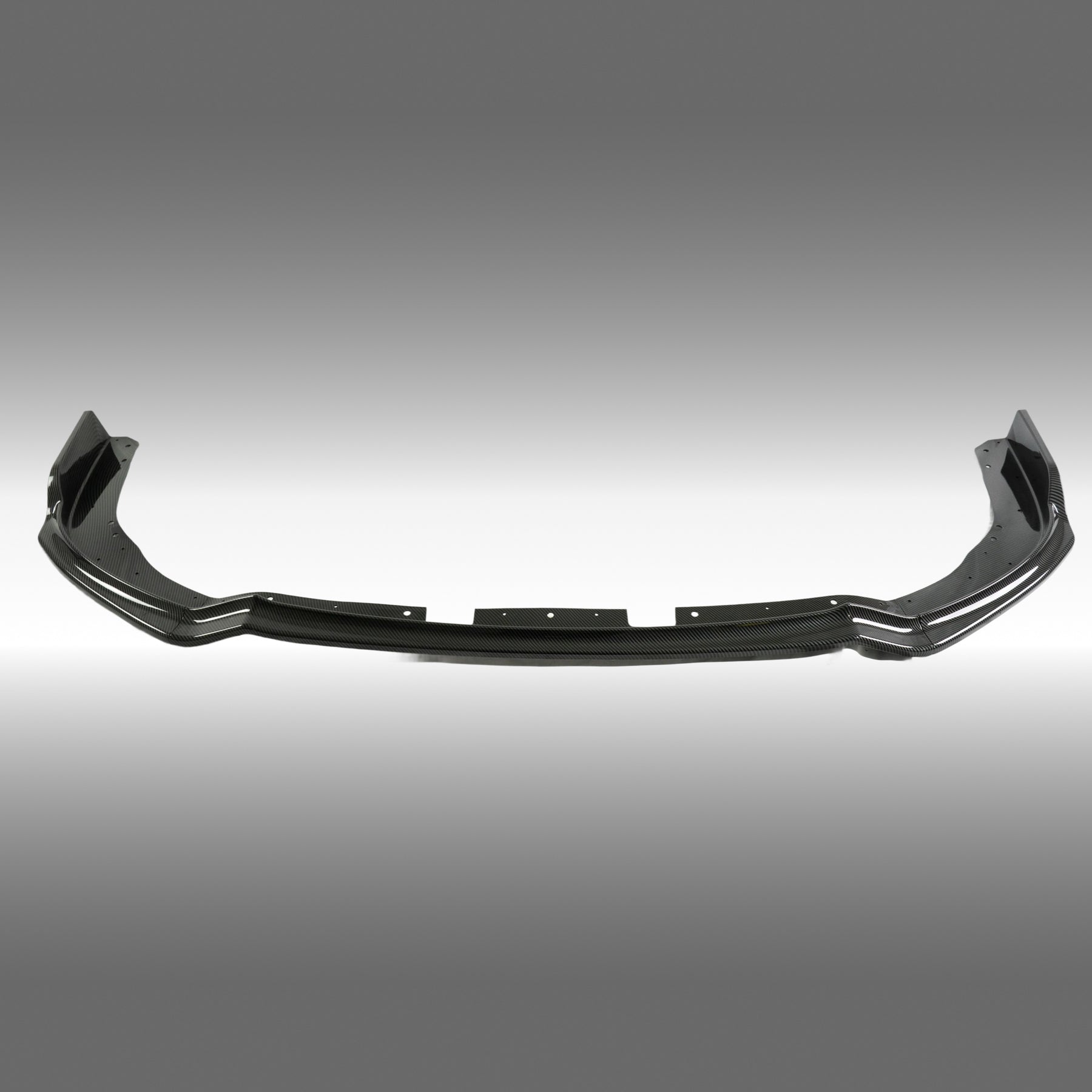 Carbon fiber print front splitter lip installed on a 2011 Subaru Impreza WRX STI