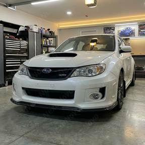 Close-up of the high-definition carbon fiber print weave on the 2011-2014 Subaru STI front lip