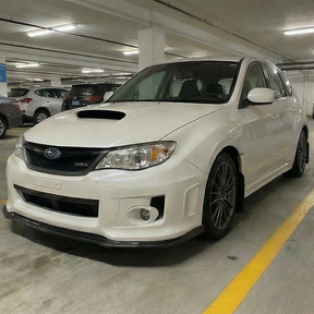 Direct front-facing view of the carbon fiber print front lip for 2011-2014 STI