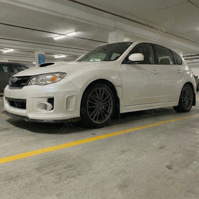 Durable high-impact ABS plastic construction of the 2011-2014 STI carbon print front lip