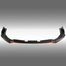 Carbon fiber print front splitter lip with red accent trim installed on a 2011 Subaru Impreza WRX STI