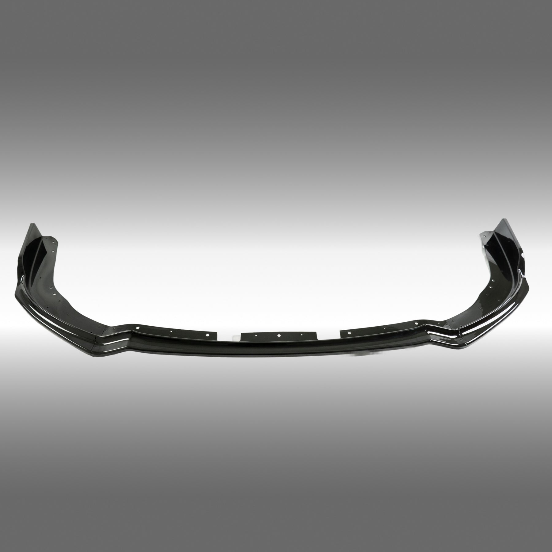 Direct front-facing view of the high-gloss black front lip for 2011-2014 STI