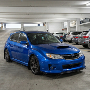 Full 3/4 view of a 2012 Subaru WRX STI with the gloss black front lip kit
