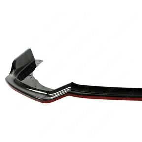 Detailed shot of the vibrant red pinstripe on the 2013 STI gloss black front splitter