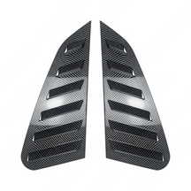 Detailed shot of the high-definition carbon fiber print weave on the GV window louvers