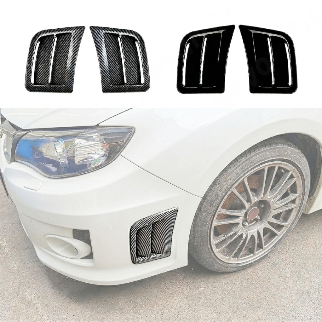 Close-up showing the precision fitment of the replacement vents against the STI bumper housing