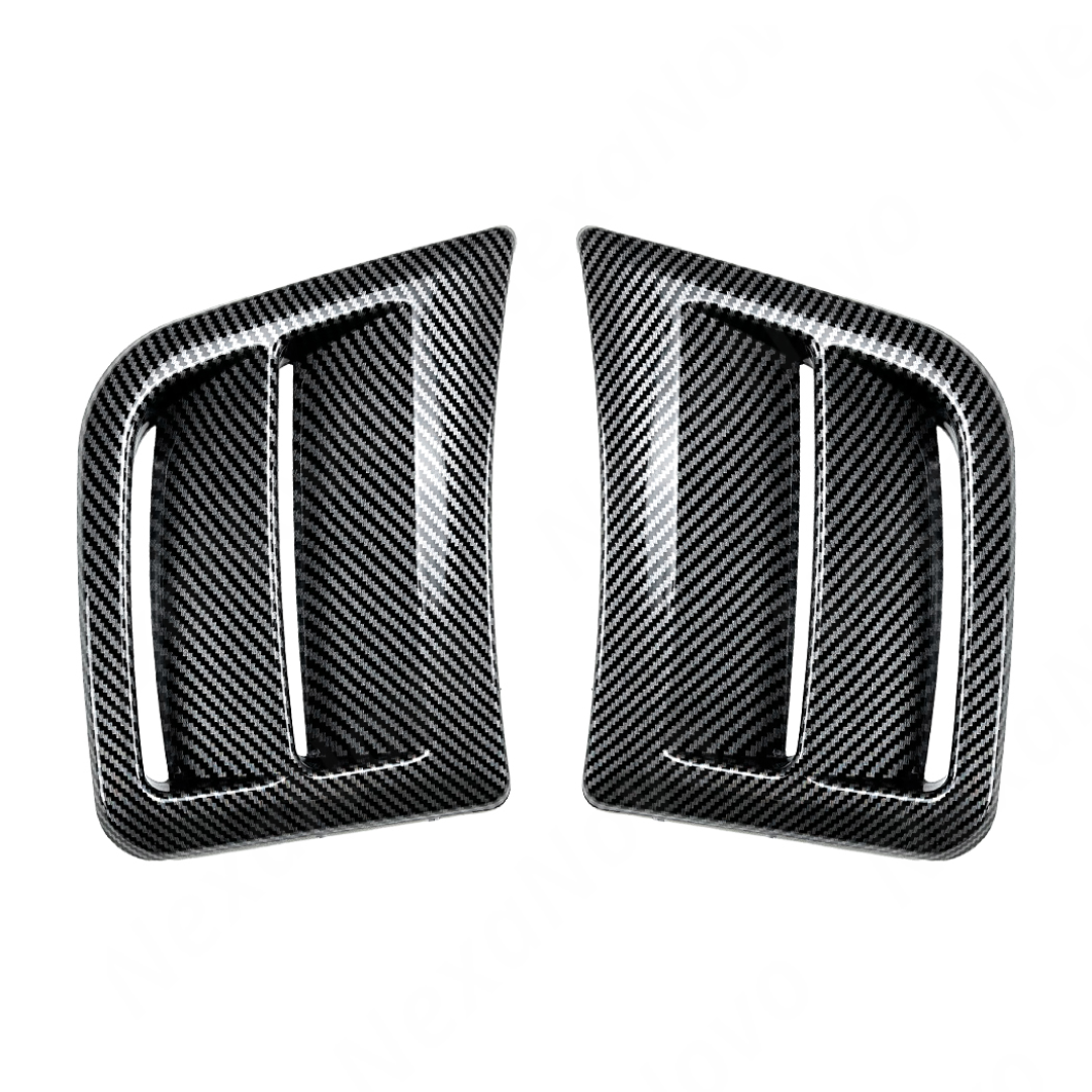 Detailed shot of the high-definition carbon fiber print weave on the STI bumper vents