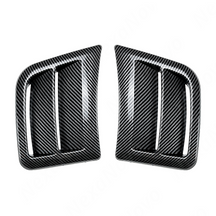 Detailed shot of the high-definition carbon fiber print weave on the STI bumper vents