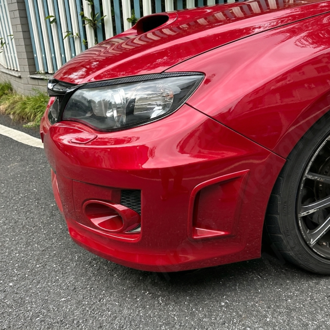 Side perspective highlighting the low-profile aerodynamic design of the carbon print eyelids