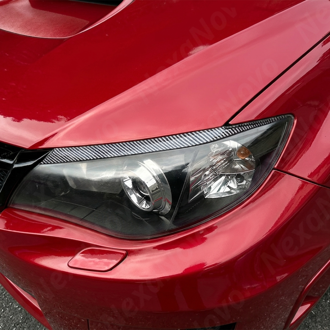 Detailed shot of the high-definition carbon fiber print weave on the GV/GR headlight eyelids
