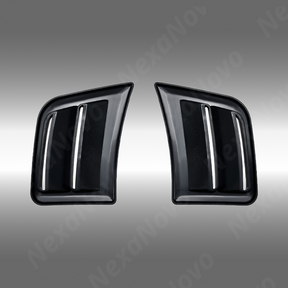Close-up of the mirror-finish gloss black coating on the STI front bumper air ducts