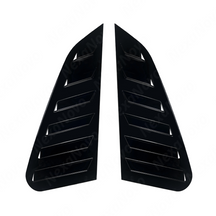 Close-up of the aggressive triple-slat vent design on the GV WRX gloss black window louvers