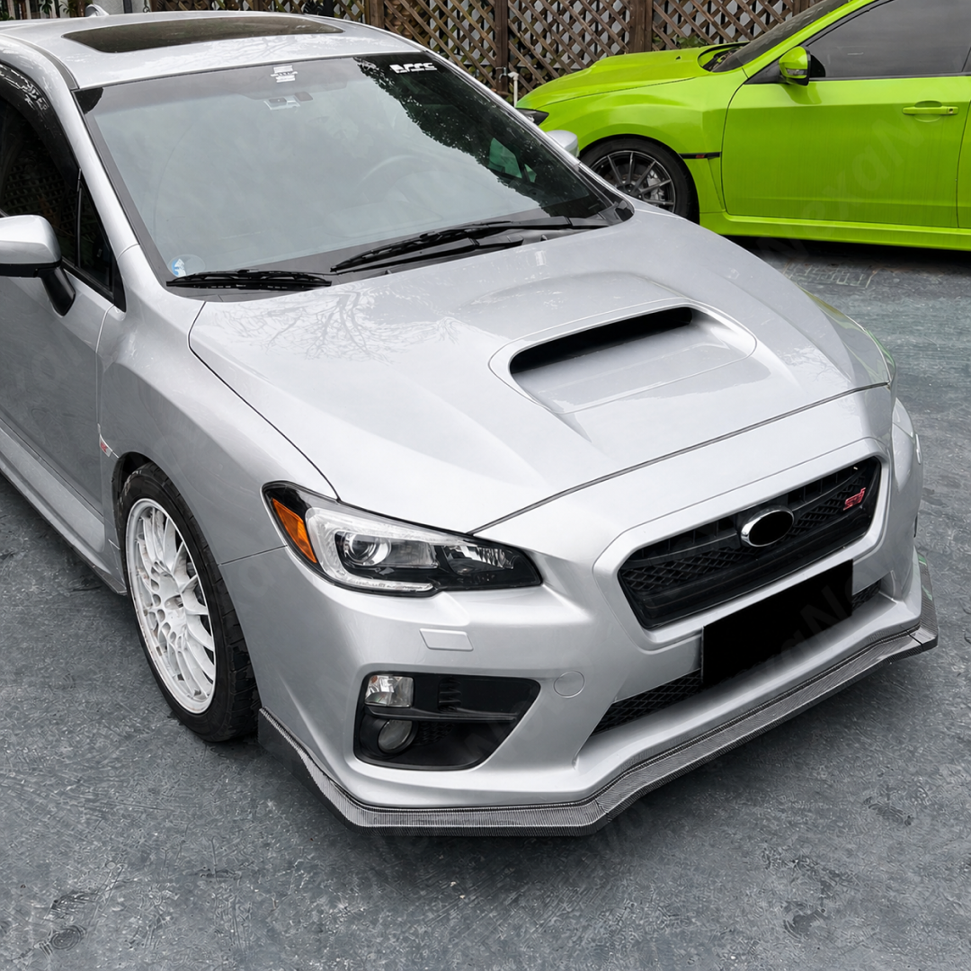 Sporty carbon fiber print JDM lip providing a race-inspired look on a Silver Subaru VA