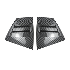 Detailed shot of the high-definition carbon fiber print weave on the VA window louvers