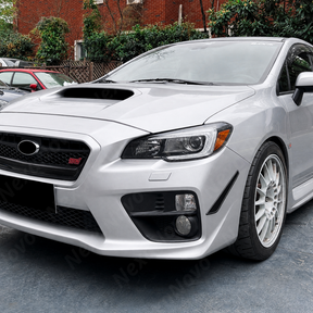 Pair of gloss black front bumper aero canards installed on a 2018 Subaru WRX STI VA