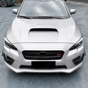 Direct front-facing view of the symmetrical gloss black bumper winglets for 2015-2021 WRX