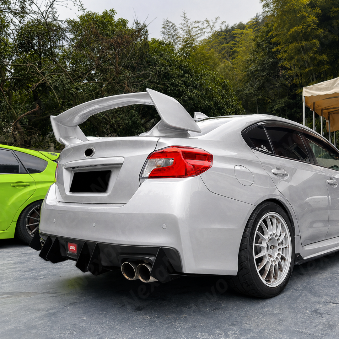 Pair of gloss black rear diffuser shark fin splitters installed on a 2018 Subaru WRX STI VA
