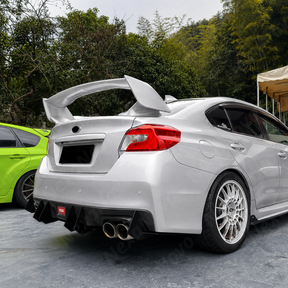 Pair of gloss black rear diffuser shark fin splitters installed on a 2018 Subaru WRX STI VA