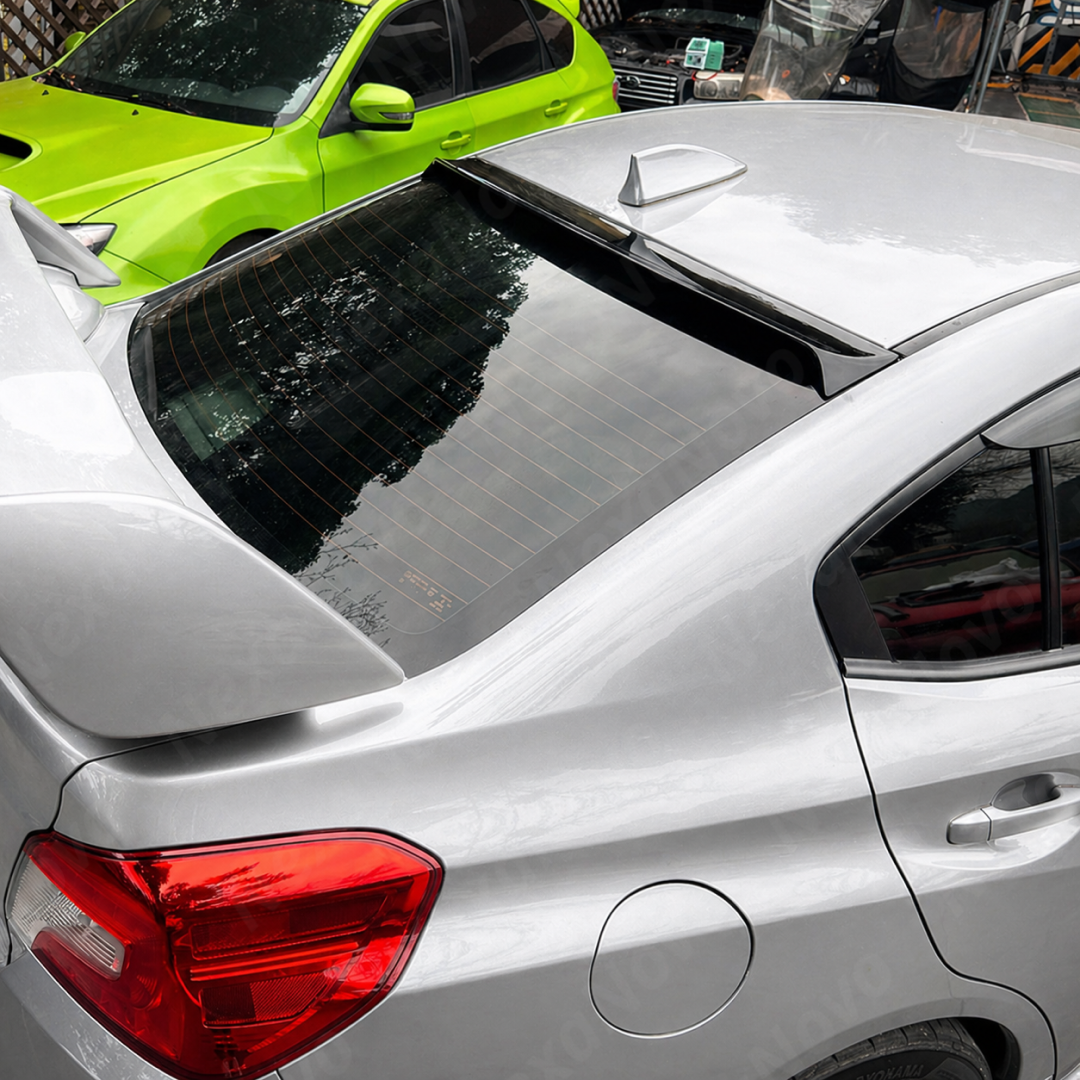 Gloss black rear window visor roof spoiler installed on a 2018 Subaru WRX STI VA