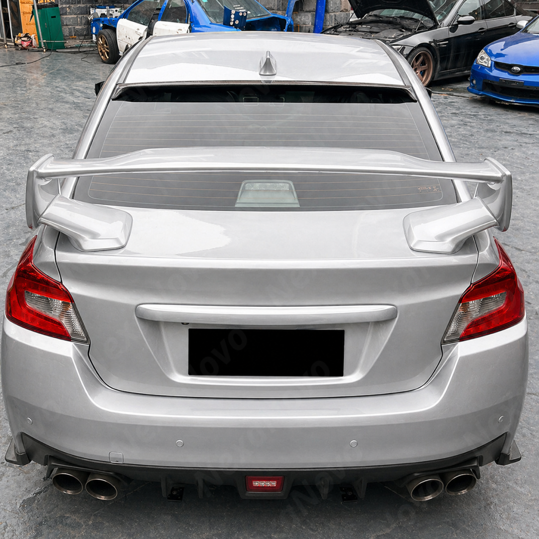 Complete rear-end view of a Subaru WRX featuring the gloss black window visor extension