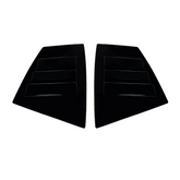 Close-up of the aggressive triple-slat vent design on the VA WRX gloss black louvers