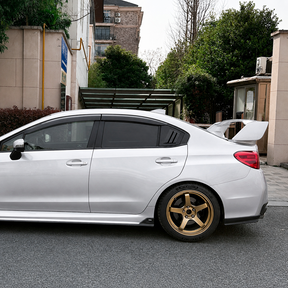 Full rear 3/4 view of a Subaru WRX VA featuring gloss black side window louvers