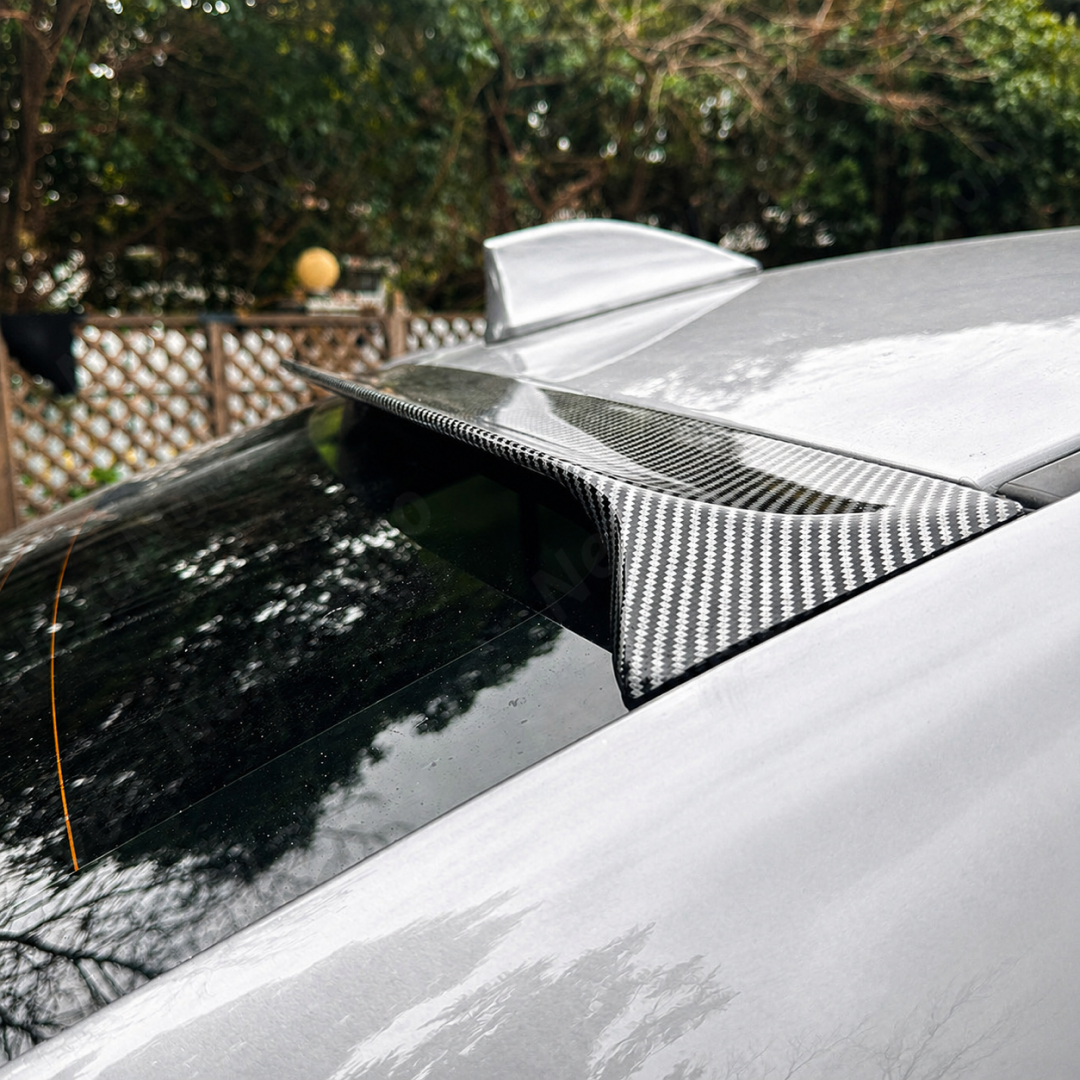 Detailed view showing the flush mount fitment against the VA roofline and rear glass