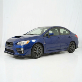 Full 3/4 view of a 2018 Subaru WRX STI featuring NexaNovo black side splitters