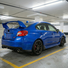 Race-inspired black side spoilers on a modified Subaru WRX VA chassis