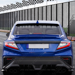 Aggressive carbon print rear window spoiler installed on a 2023 Subaru WRX VB