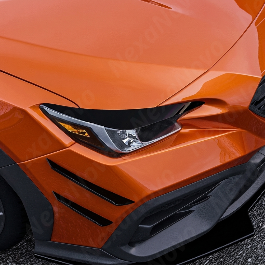 Pair of gloss black headlight eyelid overlays installed on a 2022 Subaru WRX VB