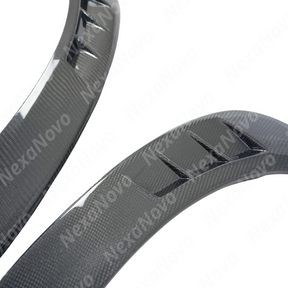 Low angle view emphasizing the NexaNovo carbon fiber fender trims