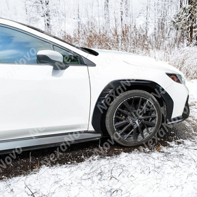 A pair of uninstalled NexaNovo real carbon fiber wide body front fender flares