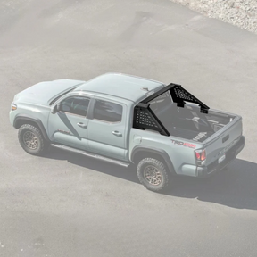 Adjustable NexaNovo chase rack roll bar installed on a Toyota Tacoma