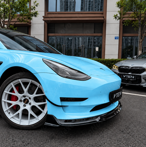 Detailed close-up of the mirror-finish gloss black clear coat on the NexaNovo 1-piece front lip splitter