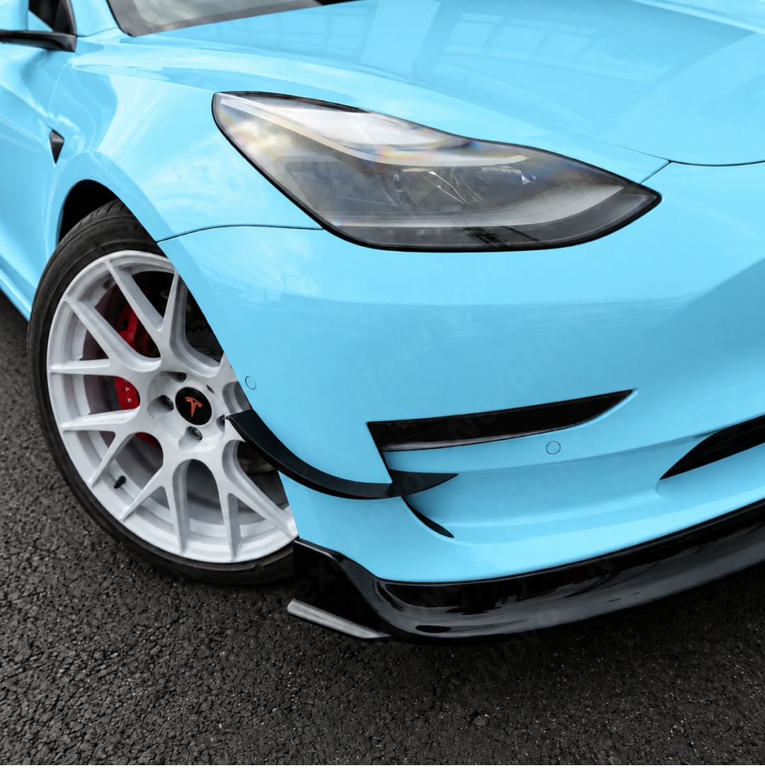 Reflective UV-resistant high-gloss top coat on the NexaNovo VTEN front splitter under outdoor sunlight