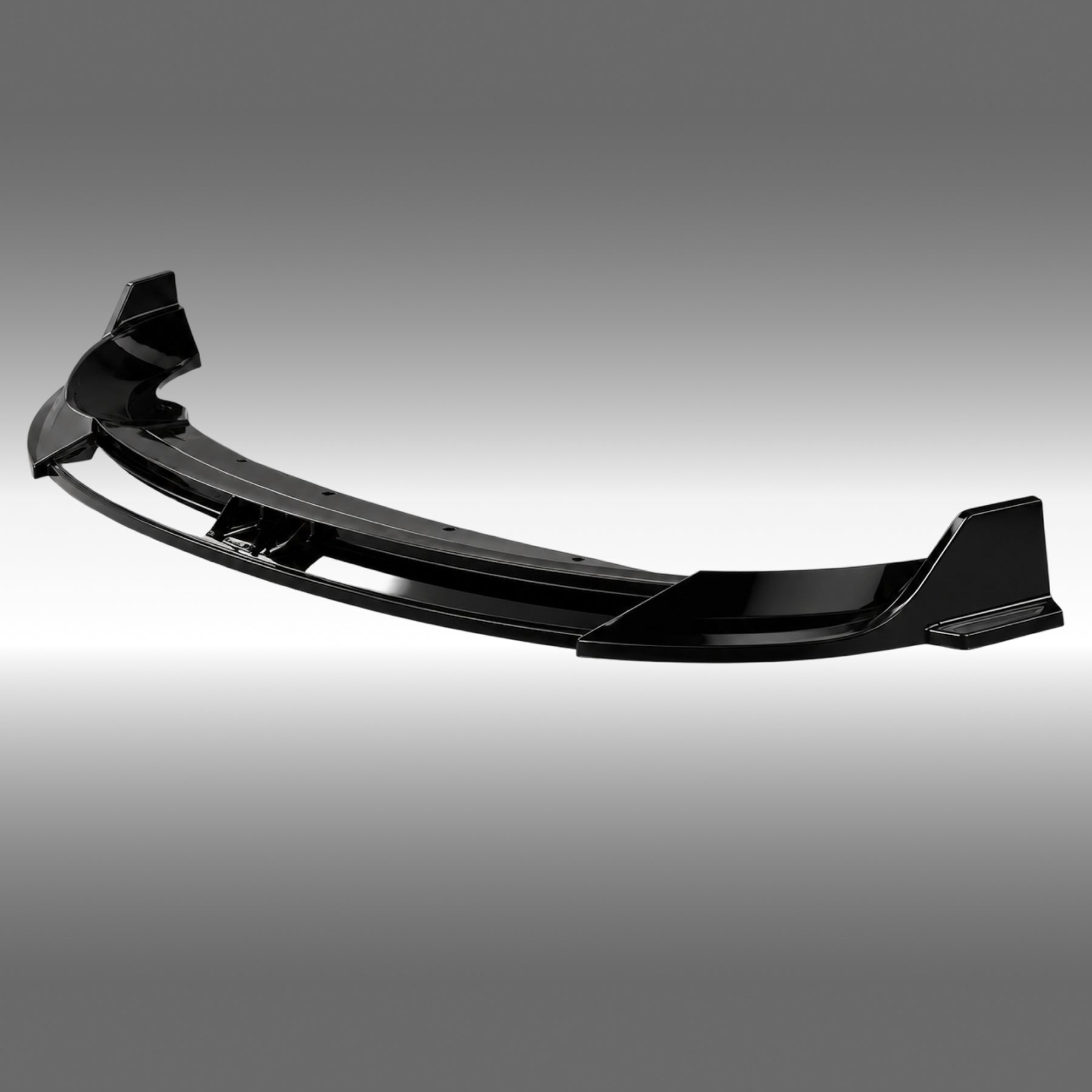 NexaNovo VTEN style 1-piece gloss black front bumper lip splitter installed on a 2024-2026 Tesla Model 3 Highland